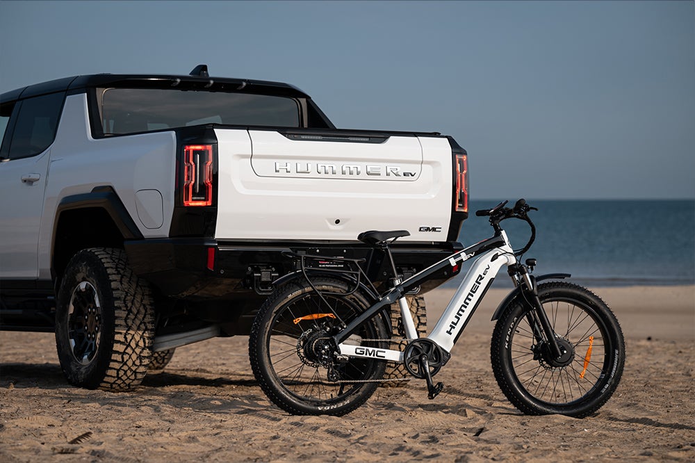 Hummer-EV-bike-with-Hummer-on-beach